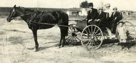 A black and white photo of a horse and buggy, the primary means of getting to church each week,