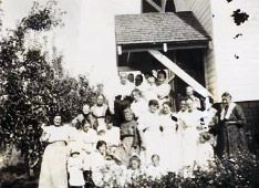 A black and white photo of an old ladies group, Ladies Aid Society